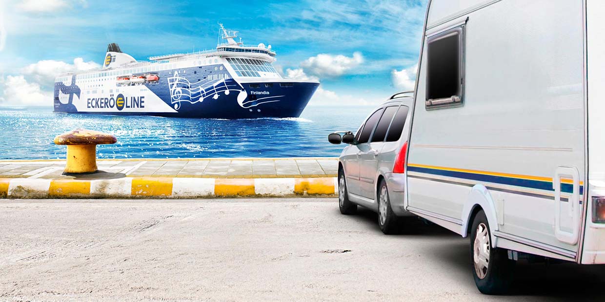 MS Finlandia arriving at the harbour with a car and caravan waiting at the dock