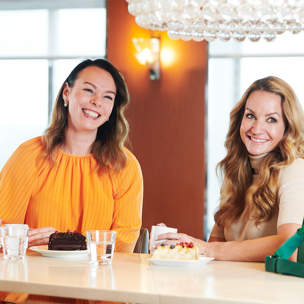 Two women enjoying coffee together