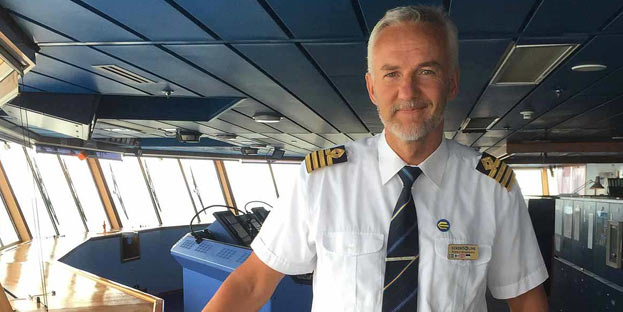 Ship captain on the bridge.