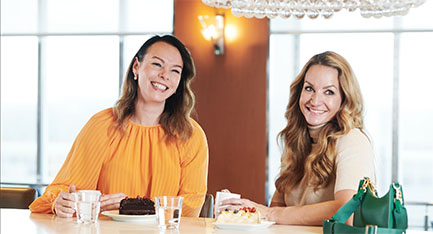 Two women enjoying coffee together